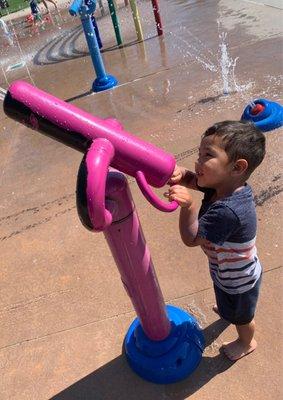 My beautiful grandson playing at Deerfield community center splash park