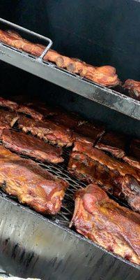 A smoker full of ribs.