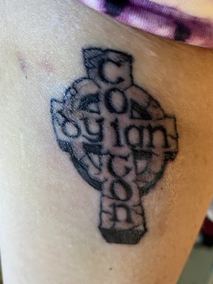 My first tat at age 60!  My boys' names (Colton and Dylan) in a Celtic cross, by Devin!!