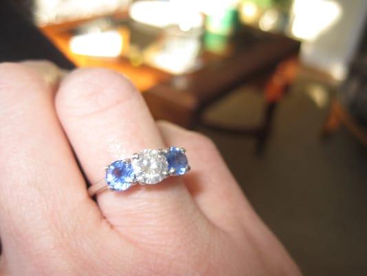 Raffie found a pair of sapphires and a platinum setting to reset my diamond.