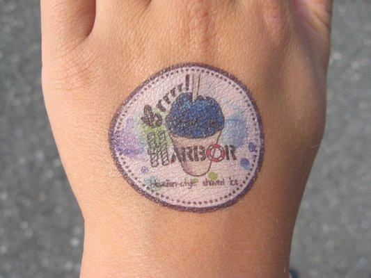 Get a temporary tattoo of our logo.