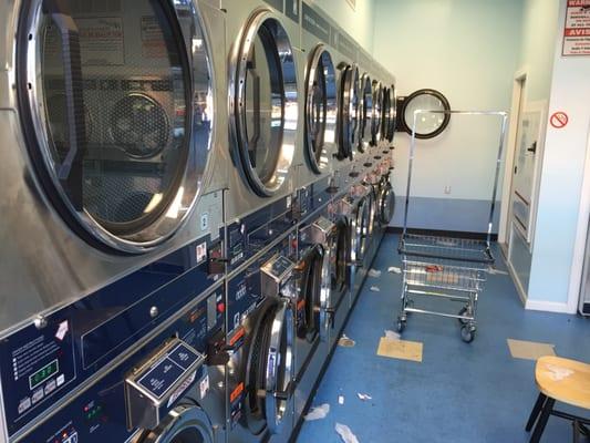 A row of washers and dryers.