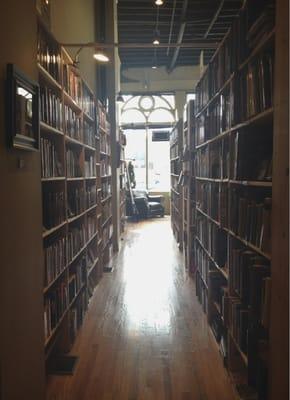 Aisles and aisles of books and little reading nooks