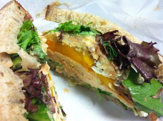 Fresh roasted turkey, sharp cheddar, grilled onions, fresh tomato & mixed greens with homemade Russian dressing