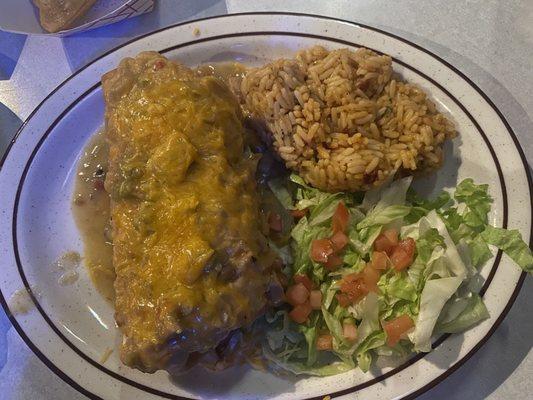 Beef chimichanga with green chili, and Spanish rice.