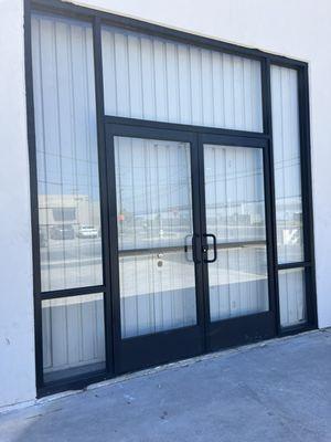 Completed double doors store front with panic exit devic! (1 day install)