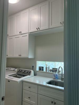 laundry room - to ceiling cabinetry