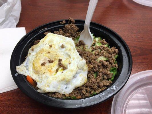 "wellbeing" bowl with beef, egg, cucumber, carrots, lettuce and bean sprouts