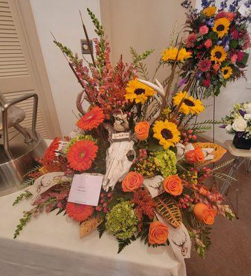 Colonial Florist's arrangement for our dear friend who was a hunter.