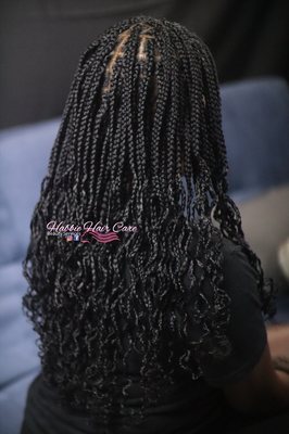 traditional box braids with curly ends