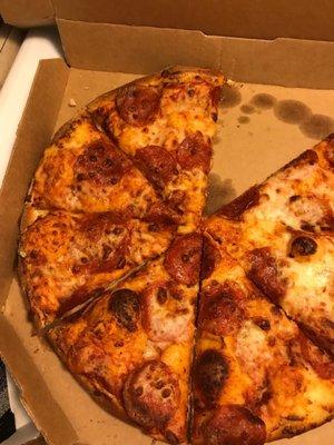 Burned crust I went and looked at Dominos website and I did not see any of the pictures of the pizza on the website look like this