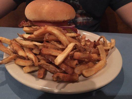 Classic burger with fries. Added cheese, bacon, and jalapeño.