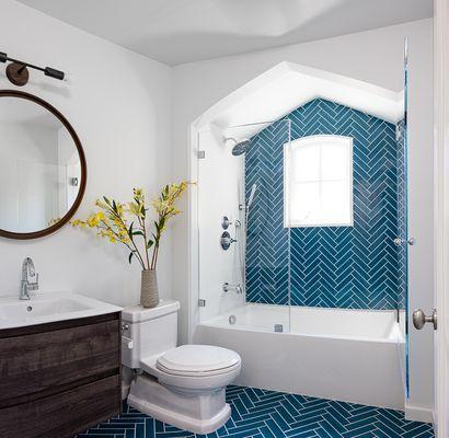 Custom bathroom with herringbone tiles