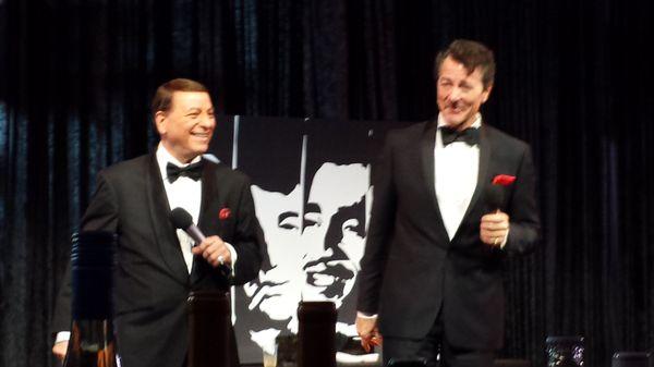 Frank and Dino impersonators having fun on stage.