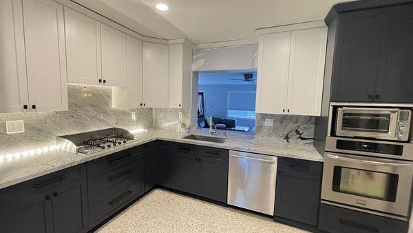 After Refinishing kitchen cabinets two tone.