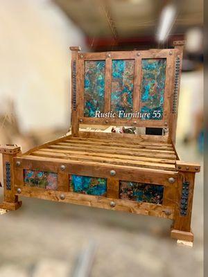 Copper Panels with hints of turquoise sets this bed apart from the others. Bed can be customize to have a ledge bench.