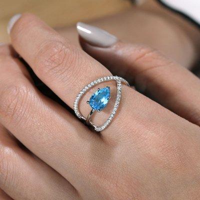 14kt white gold blue topaz and diamond ring