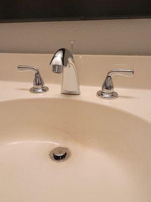 Install new bathroom faucet