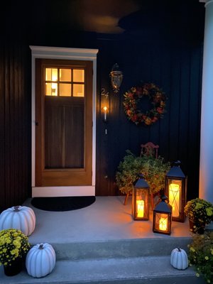 The flameless candle in the holder by the door is a sweet little "extra" at night