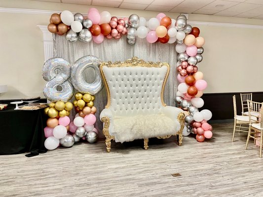 Love Seat Throne backdrop balloon garland and columns