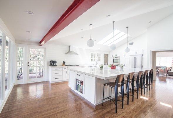 Exposed structural steel and skylights in Long Beach kitchen remodel.