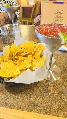 Strawberry mockarita  and chips with salsa and guacamole