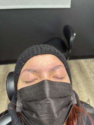 Waxing eyebrows