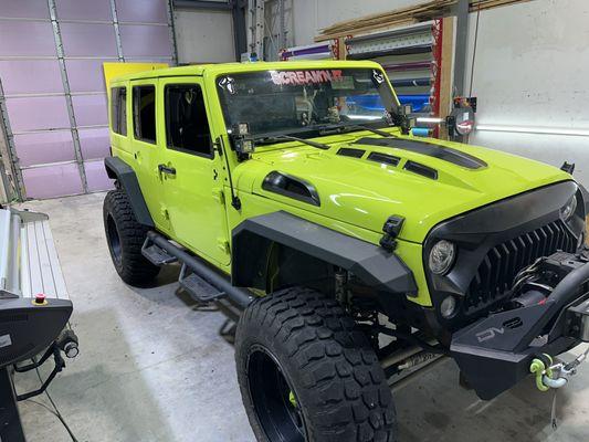 Scream n it pennywise ghostface jeep wrangler vinyl wrap 3m satin black avery lime green vehicle vinyl wrap STW Wraps and Graphics