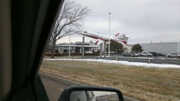 A real Learjet mounted in front of the offices.