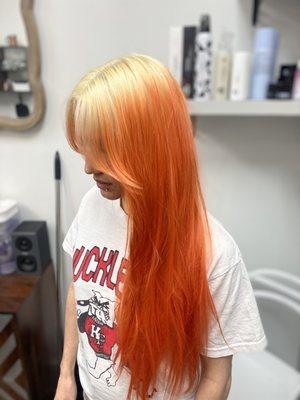 Blonde roots with orange ends