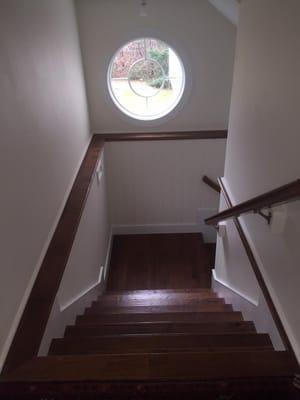 A photo of a recent set of stairs we built on Wing's Neck with Peter Coffin Builders.  Stairs were made of dark hickory floor...