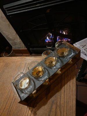 Irish whiskey flight by the fire