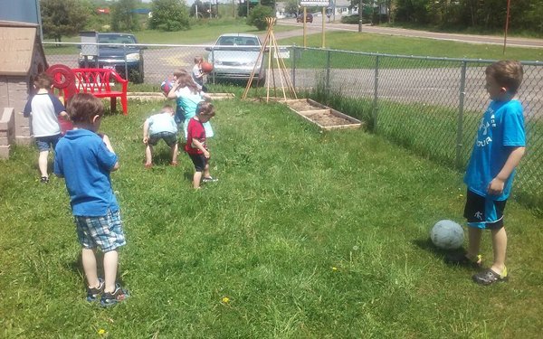 Our beautiful playground and organic garden!