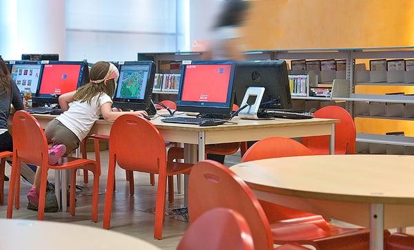 Children's library furnitured by Milder Office - shown here computer tables and circular tables. Built to your specification