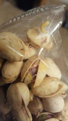 Bag of pistachios with larva.