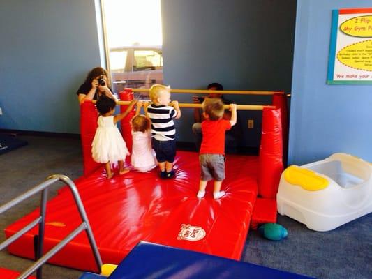 2 year olds lined up dancing to the music