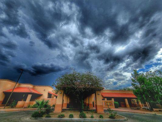 Peppi's House Main Entrance. Monsoon season clouds.