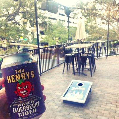 Hard cider and cornhole upstairs from Jannus Live