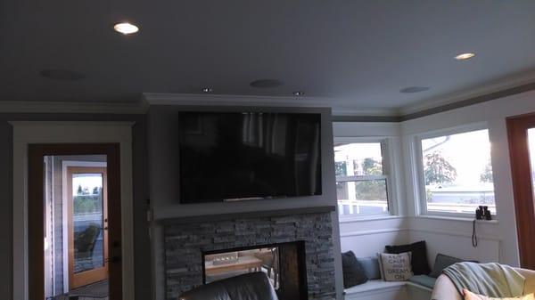 Family Room surround sound system with in-ceiling speakers, Sony LED, and custom sub built into bench cabinet