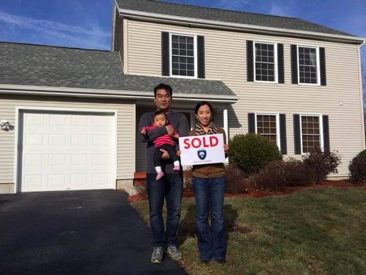 What a beautiful family celebrating the purchase of their first home!