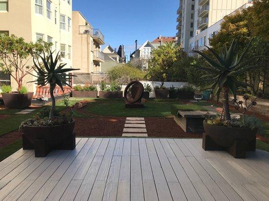 Create a beautiful rooftop garden with artificial grass like this one in San Francisco.