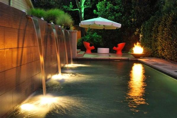 JMS LED landscape lighting job to spotlight swimming pool and surrounding trees.