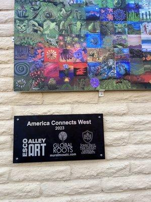 Outdoor wall mural installed in Escondido in cooperation with Global Roots Project.