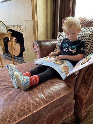 The historic library is one of several favorite reading spots in the school.