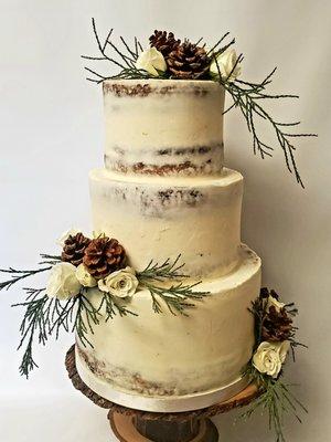 Rustic Elegance. So beautiful! Naked cake with pine cones and juniper greenery and a few fresh roses.