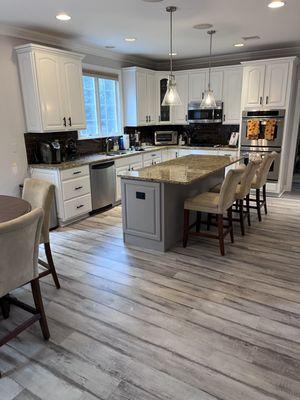 Our customer in Riverdale completely transformed the look of his home with this Shaw LVP in the color Driftwood.