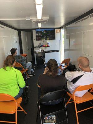 Self contained mobile classroom with media presentation.