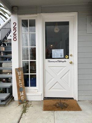 Entrance to Minnie's at the bottom of the stairs.