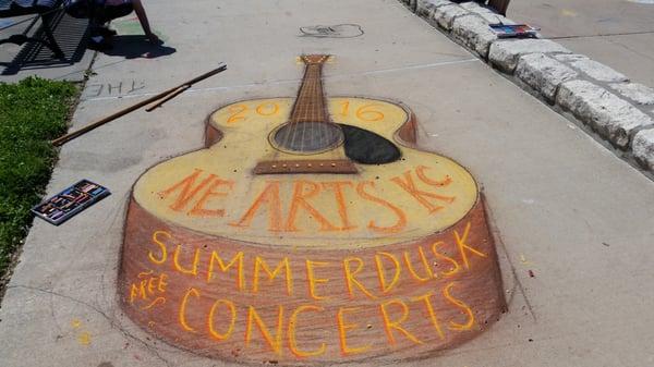 Chalk Art of the 2016 Summer Dusk Free Concert Series created at the Concourse Park  by Scott Hobart.