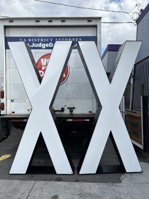 8' tall plywood letters sign with LED around the edges